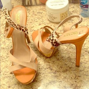 Peach and cheetah print pumps